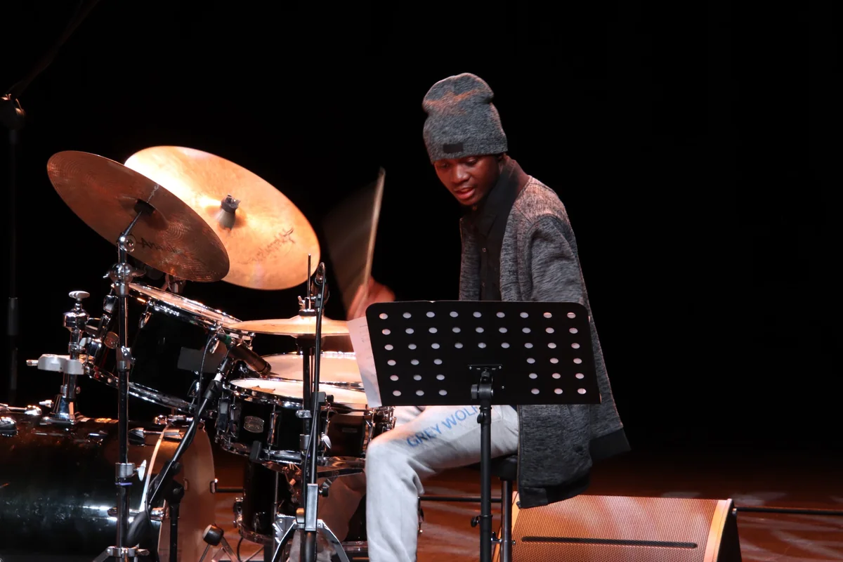 Drummer performing on stage